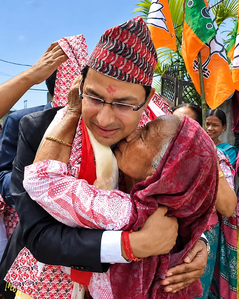 Raju Bista with residents of the hills